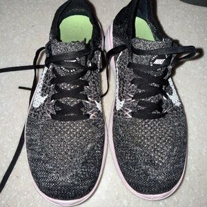 Nike Women's Black and White Knit Sneakers with Pink Sole